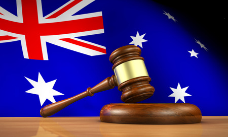 Gavel in front of an Australian flag.
