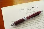 A living will document closeup with pen.