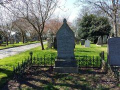 Grave Stone on Sunny Day with Shadows