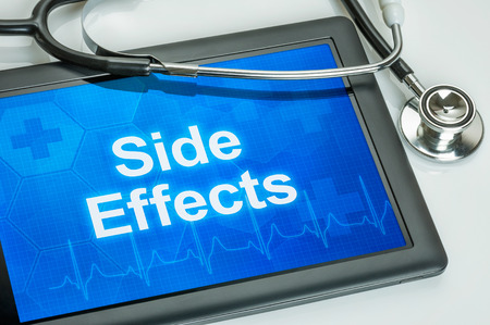 Tablet with the text side effects on the display.